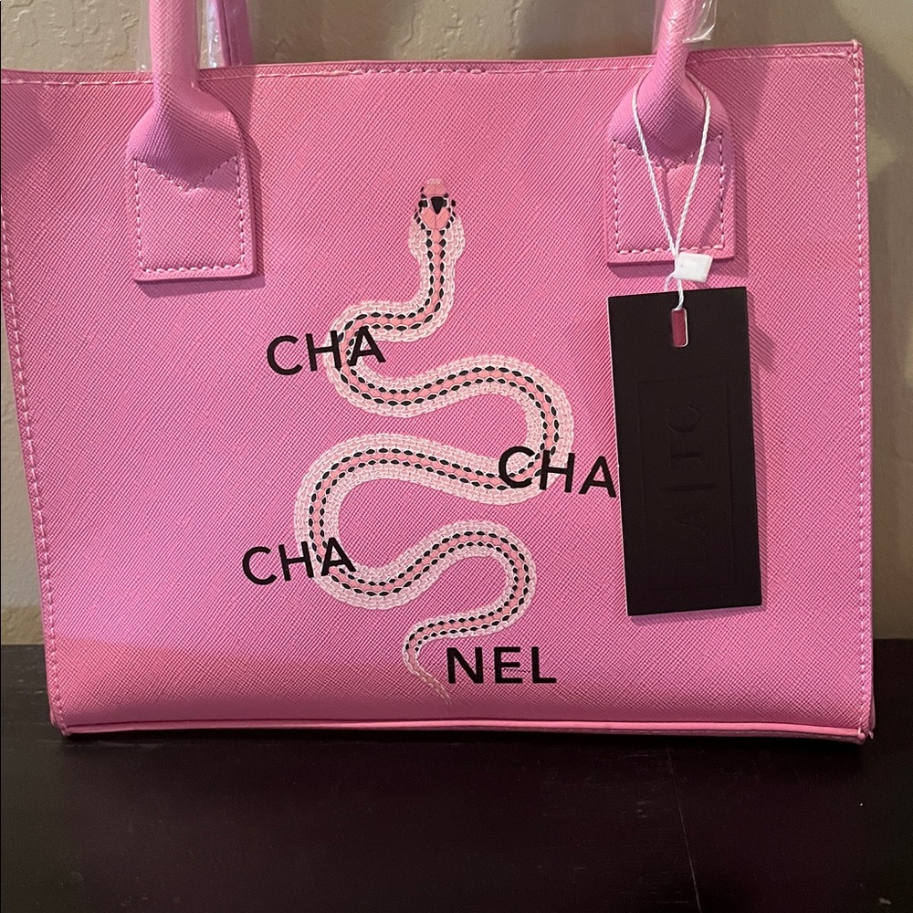 Pink vegan leather handbag. Never been used